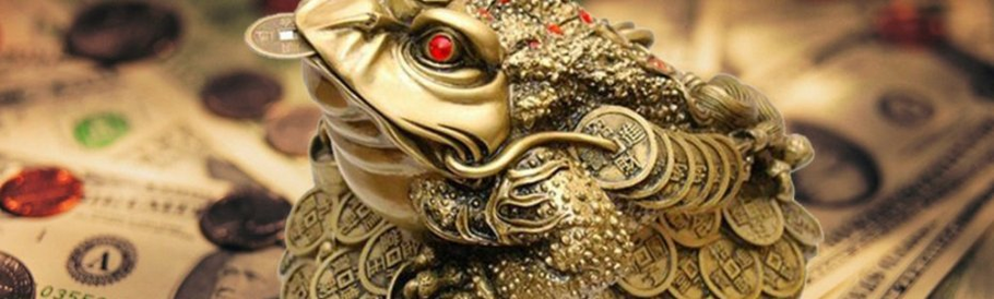 A TOAD dengan duit syiling di mulut - jimat untuk menarik wang